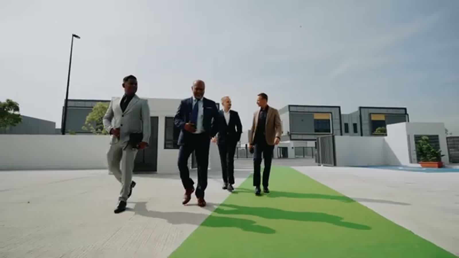About IMAGO Engineering: team walking through a modular insect bioreactor plant